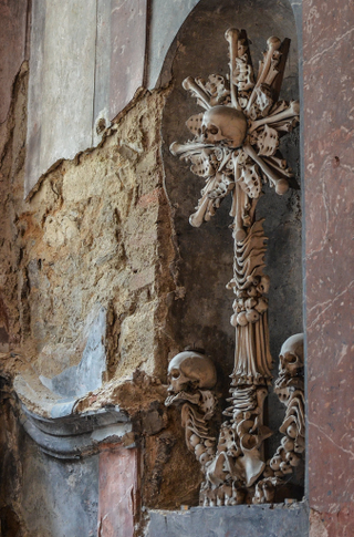 Illustration for article titled These Buildings Are Made with Skulls and Bones